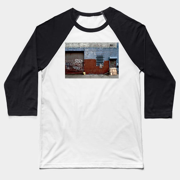 View of brick wall with spray paint in urban street in New York City Baseball T-Shirt by Reinvention